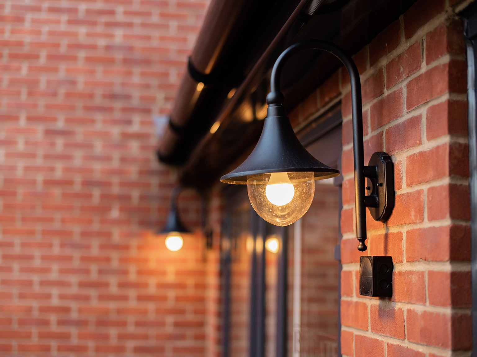 Exterior brick with porch lamp
